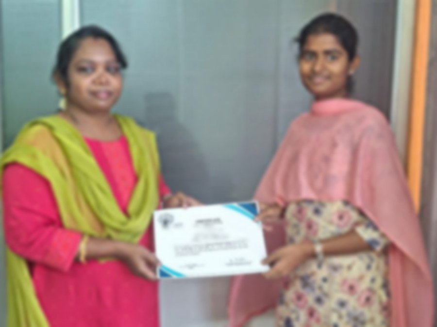 SACM student receiving a certificate of completion from her trainer